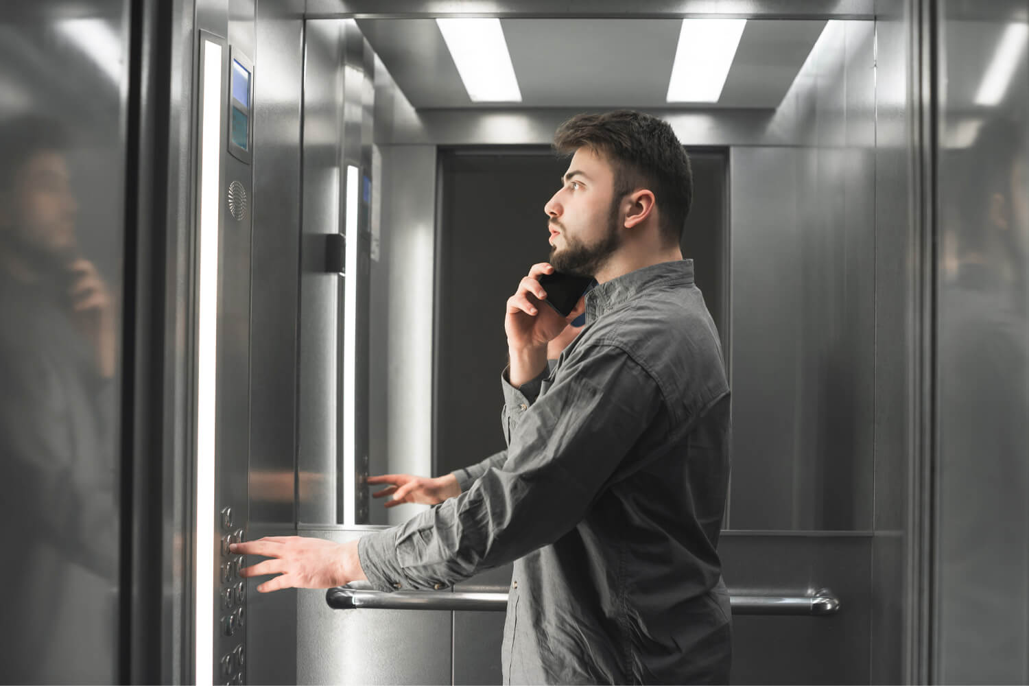 who answers elevator emergency phone